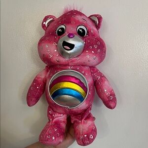 Glow in the dark limited edition Care Bears Pink Plush with Rainbow Belly